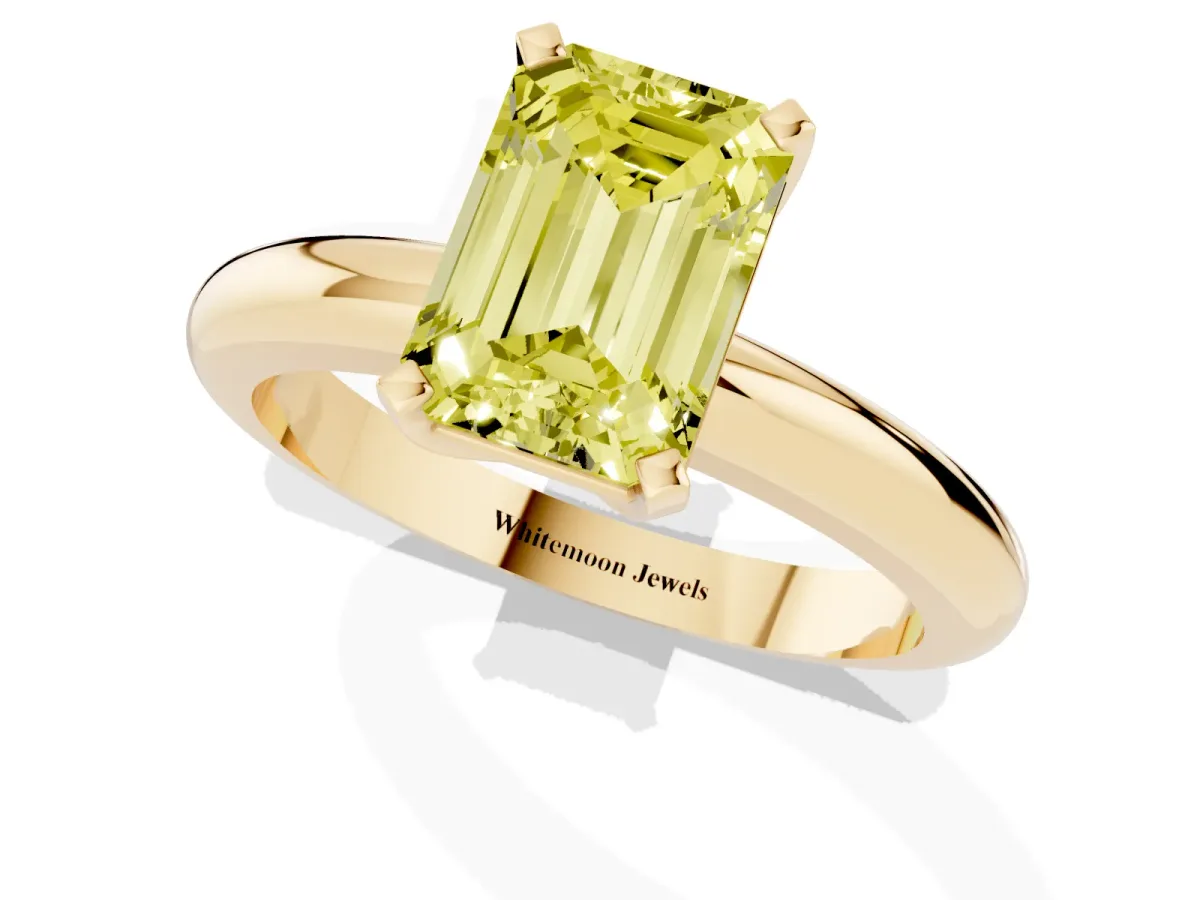 Fancy Yellow Emerald Cut Diamond Solitaire Engagement Ring with Round Band and Four-Prong Setting Yellow gold