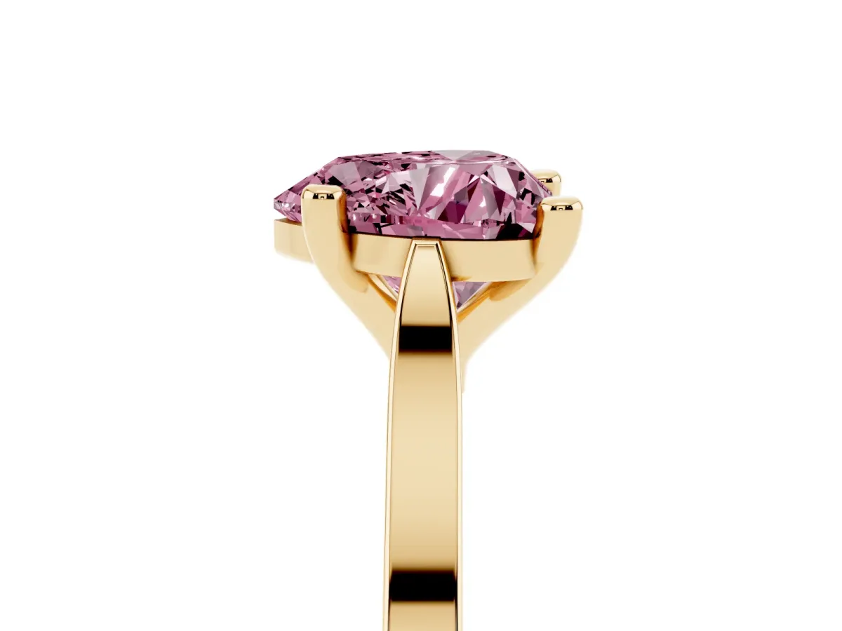 Fancy Pink Heart Cut Solitaire Diamond Ring with Four-Prong Setting and Tapered Band Yellow gold