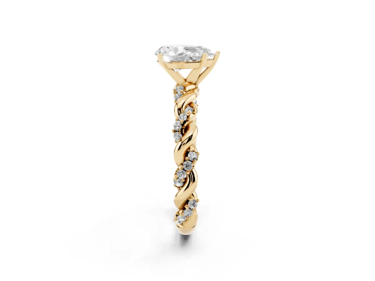 Pear Cut Diamond Solitaire Ring with Twisted Band and Pavé Accents Yellow gold