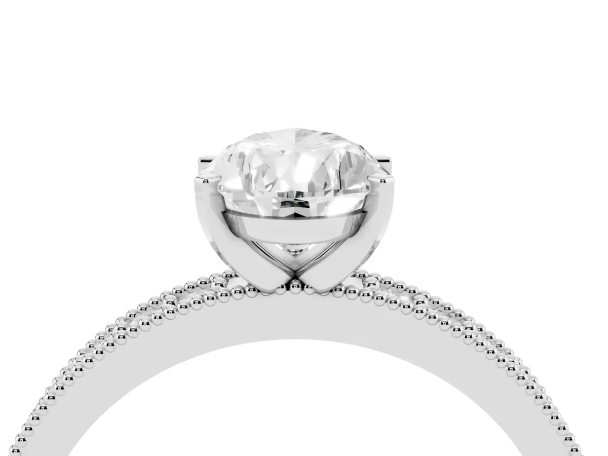 Pear Cut Diamond Milgrain Pavé Engagement Ring with Four-Prong Setting Silver