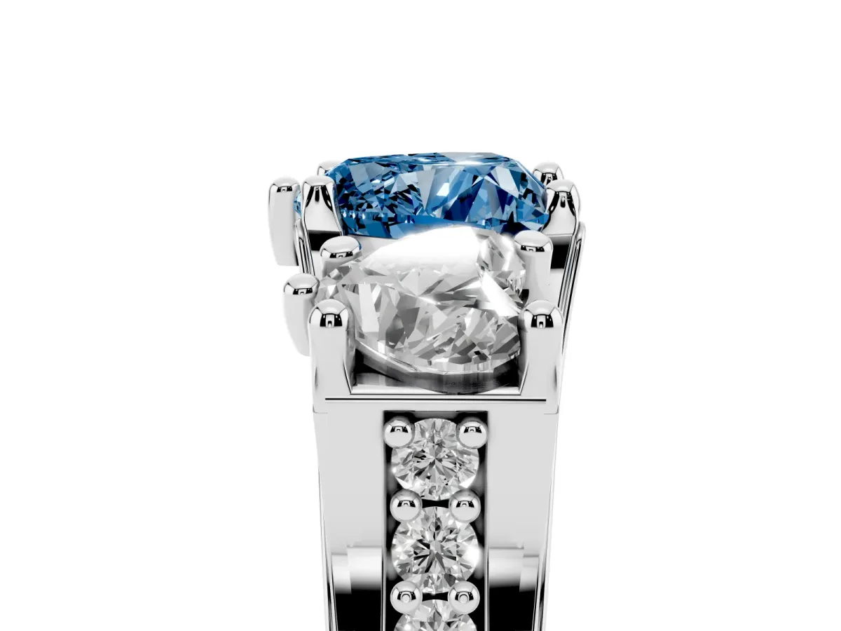 Fancy Blue Heart Cut Diamond Three-Stone Ring with Channel Set Band and Four-Prong Setting Silver