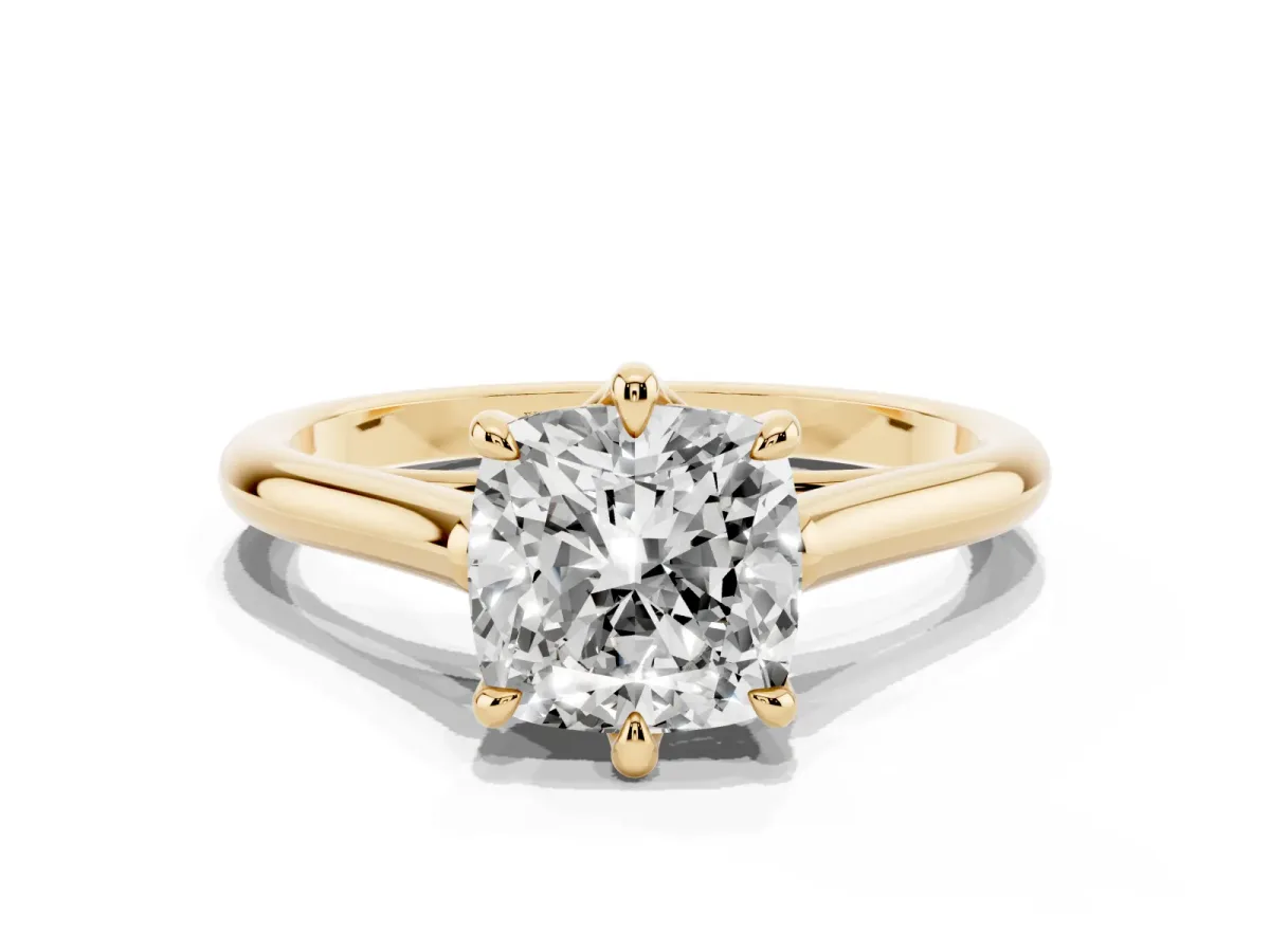 Cushion Cut Solitaire Engagement Ring with Six-Prong Setting and Classic Band Yellow gold