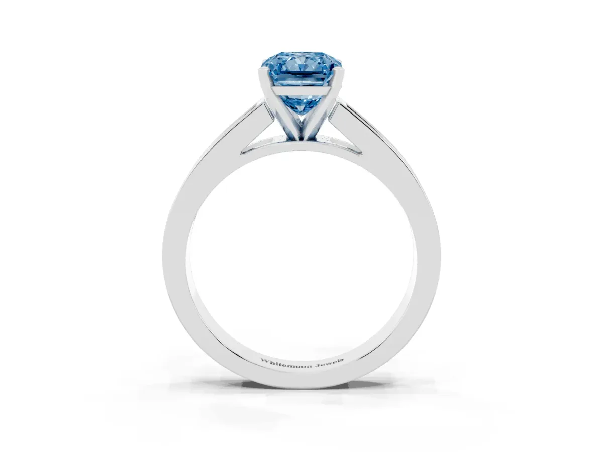 Fancy Blue Radiant Cut Solitaire Diamond Ring with Channel-Set Band and Four-Prong Setting Silver
