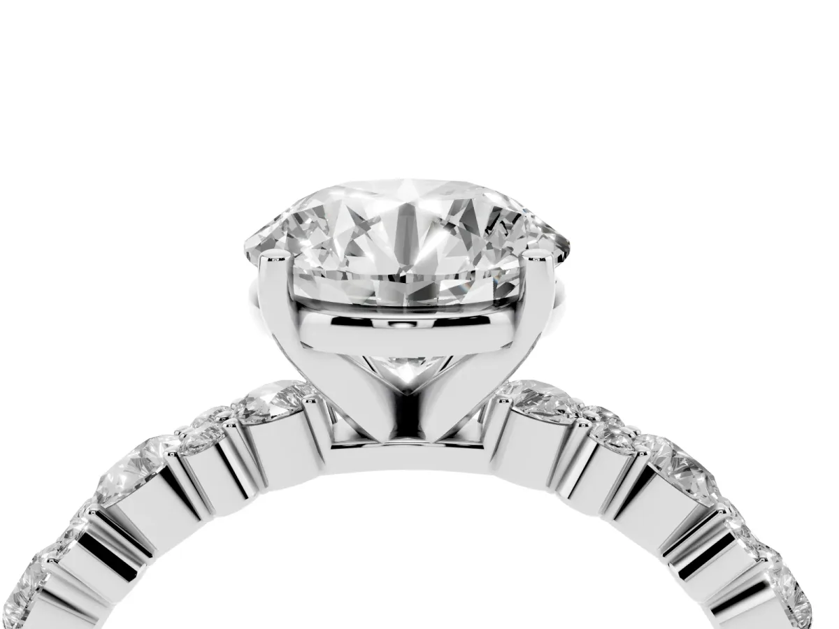 Round Cut Diamond Side Stone Solitaire Ring with Round and Four-Prong Setting Silver