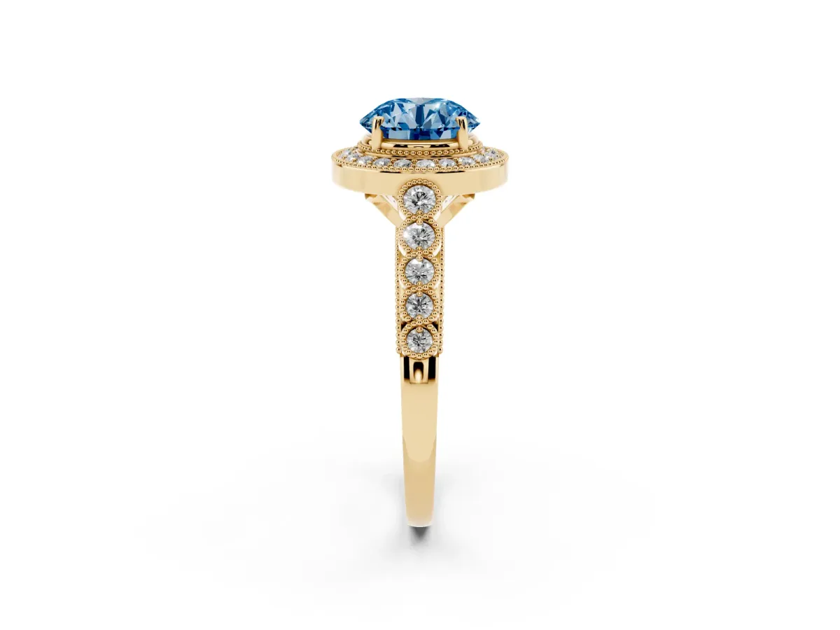Fancy Blue Round Cut Halo Milgrain Solitaire with Bezel Set Side Stones and Pave Band Yellow gold