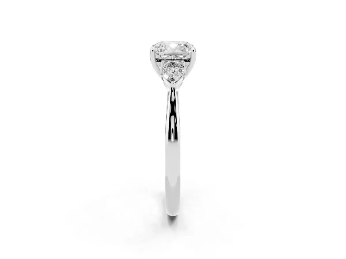 Three-Stone Cushion Cut Diamond Ring with Pear Side Stones in Four-Prong Setting Silver