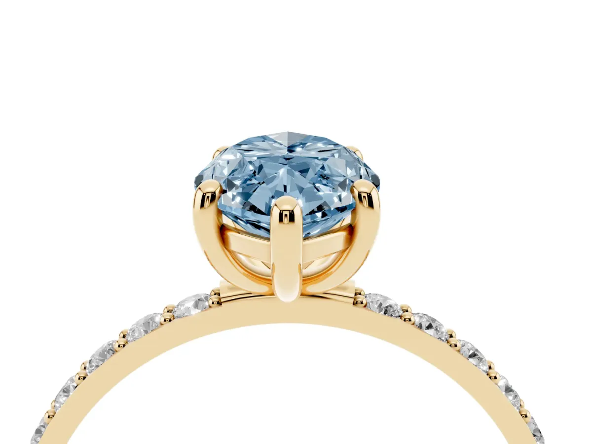 Fancy Blue Marquise Cut Diamond Solitaire Ring with Round Pavé Band and Prong Setting Yellow gold