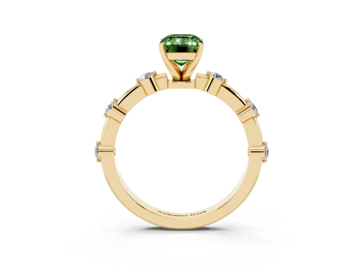 Fancy Green Emerald Cut Solitaire Diamond Ring with Bezel Set Side Stones and Prong Setting Yellow gold