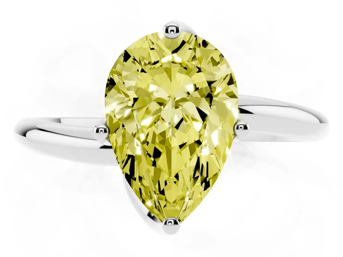 Fancy Yellow Pear Cut Diamond Solitaire Engagement Ring with Four-Prong Setting and Classic Band Silver