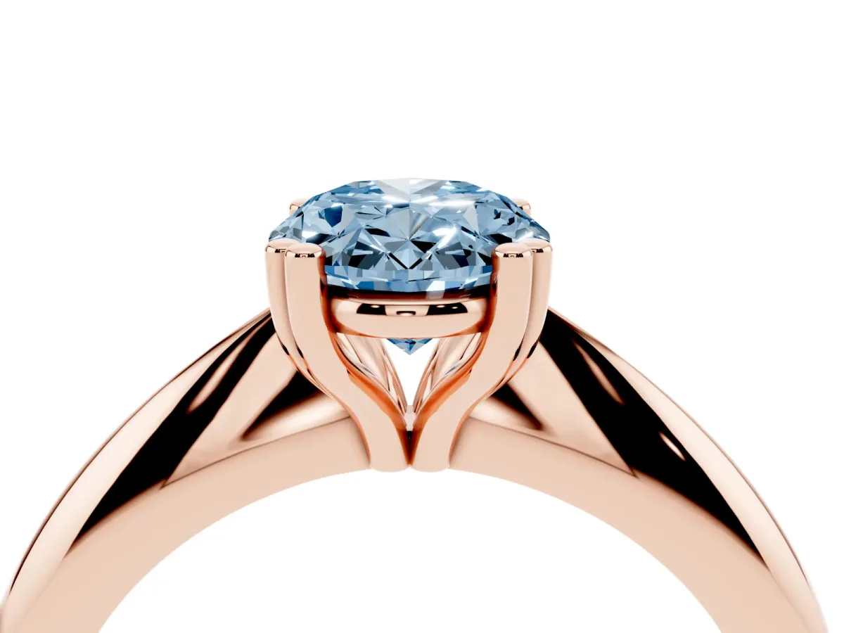 Fancy Blue Oval Cut Cut Solitaire Engagement Ring with Tapered Band and Four-Prong Setting Rose gold