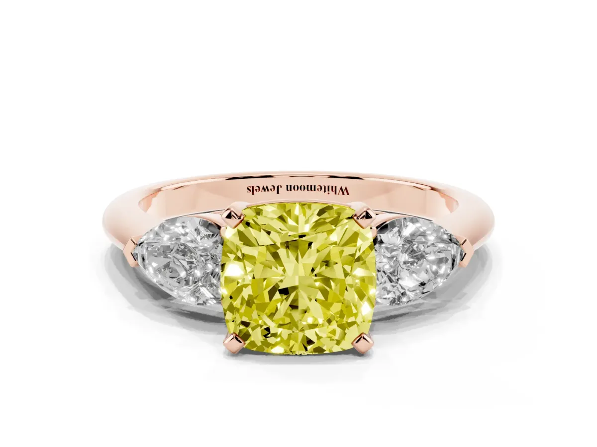Fancy Yellow Three-Stone Cushion Cut Diamond Ring with Pear Side Stones and Four-Prong Setting Rose gold