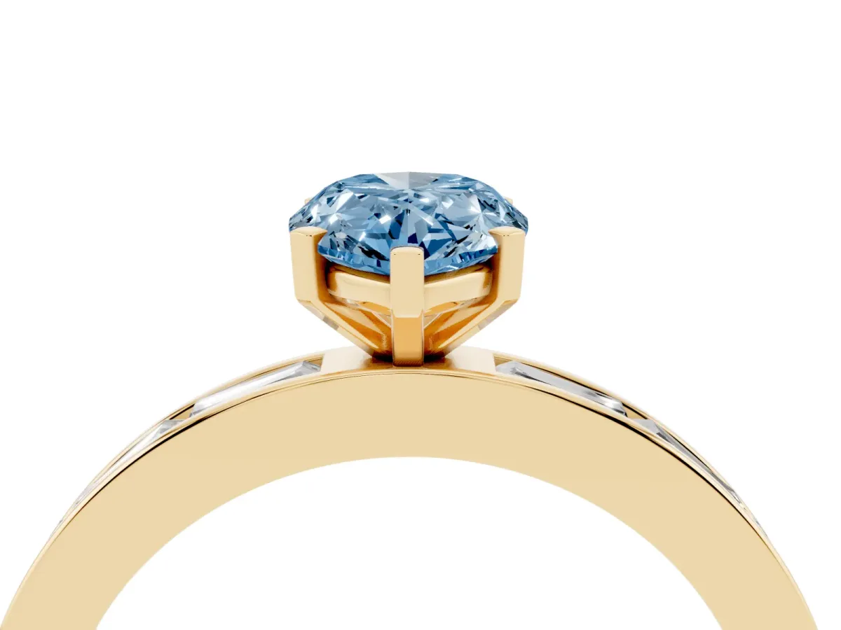 Fancy Blue Pear Cut Solitaire Diamond Ring with Channel-Set Baguette Band and Four-Prong Setting Yellow gold
