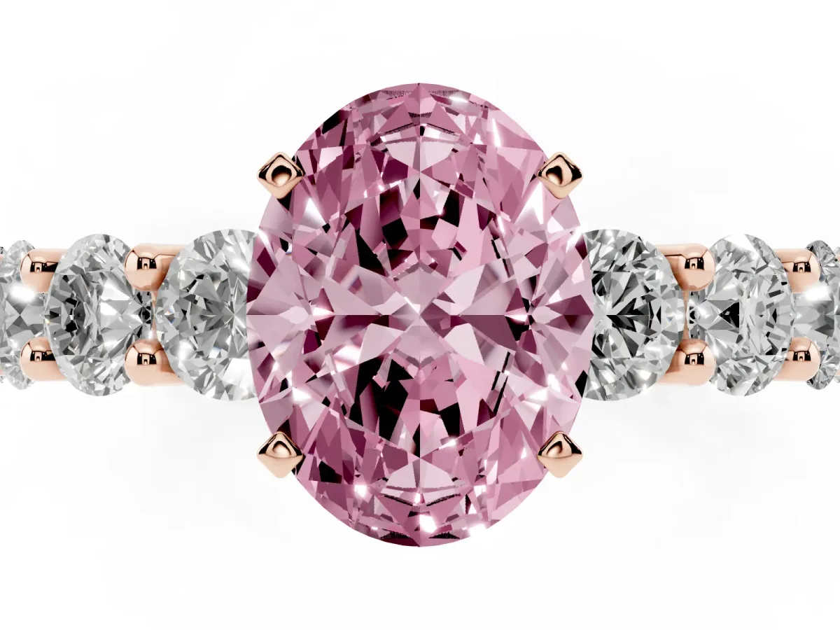 Fancy Pink Oval Cut Diamond Prong Setting with Side Stones on a Pave Band Rose gold