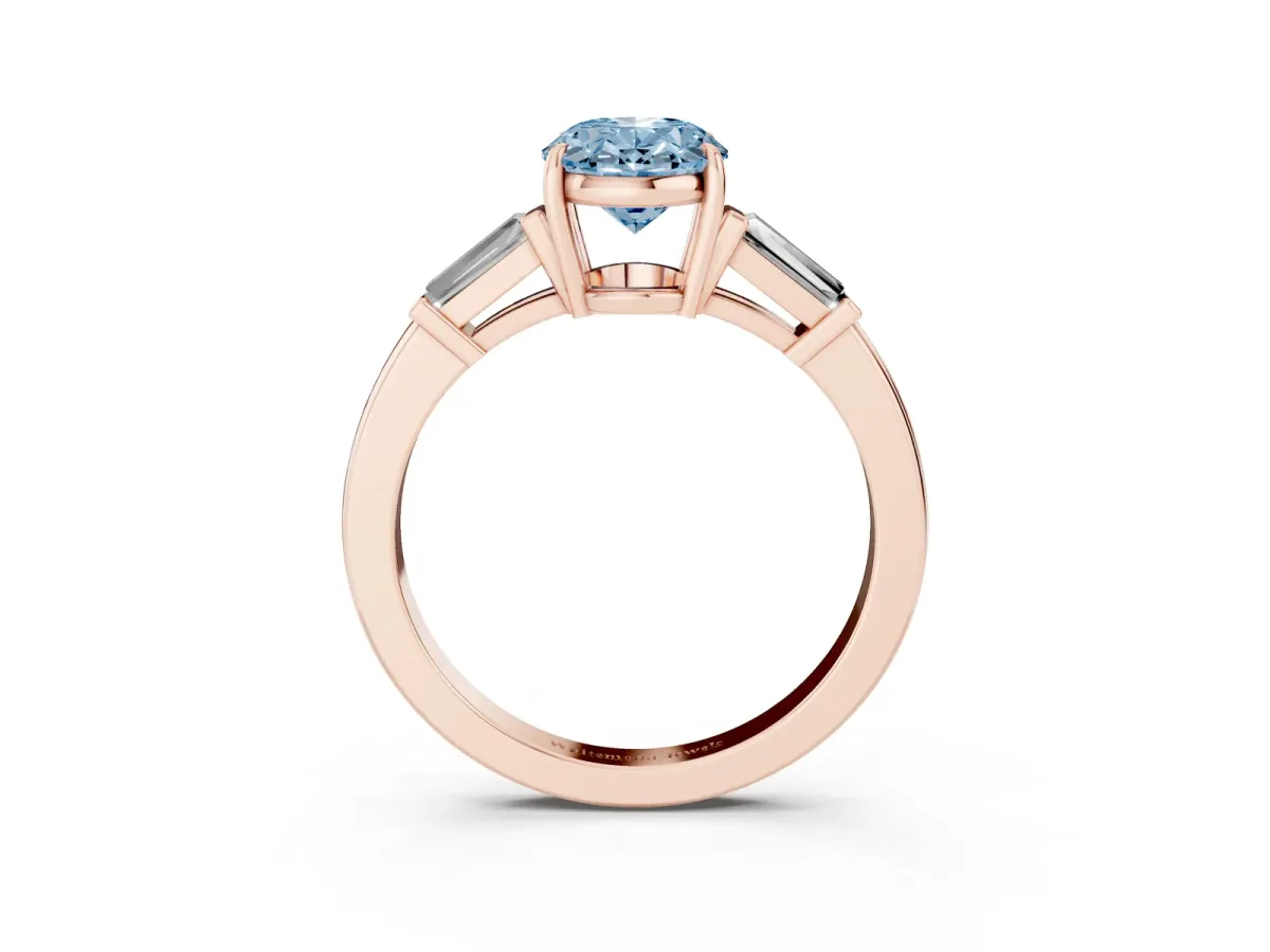 Fancy Blue Oval Cut Diamond Three-Stone Ring with Tapered Baguette Side Stones and Prong Setting Rose gold