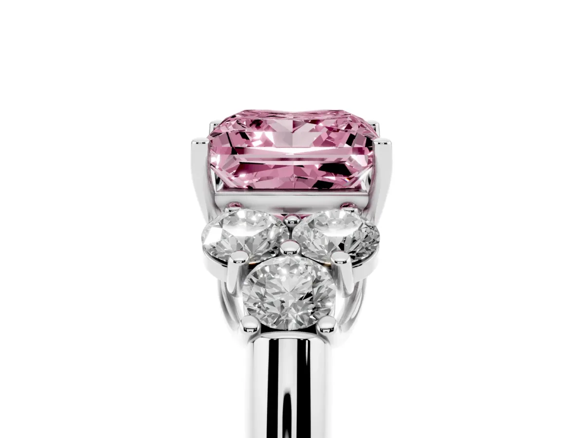 Fancy Pink Princess Cut Cut Diamond Cluster Ring with Round Accent Stones and Prong Setting on a Classic Band Silver
