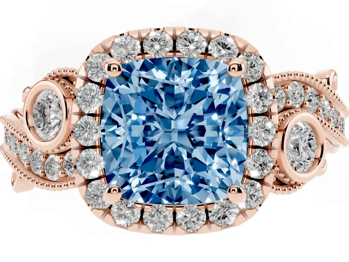 Fancy Blue Cushion Cut Halo Diamond Ring with Milgrain and Bezel Accents on a Split Shank Band Rose gold