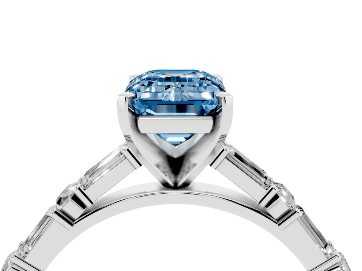 Fancy Blue Emerald Cut Diamond Solitaire with Side Baguettes and Channel Set Band Platinum