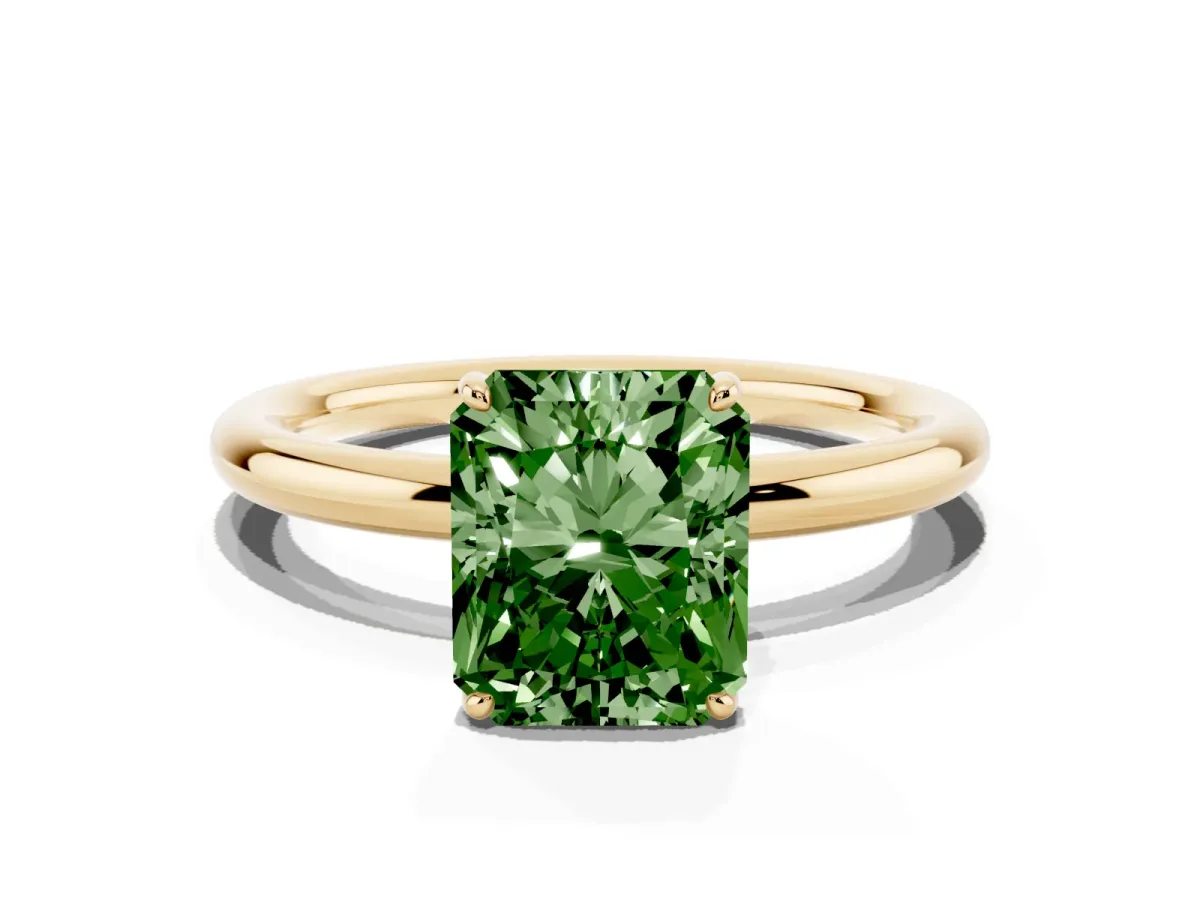 Fancy Green Radiant Cut Solitaire Diamond Ring with Four-Prong Setting on a Plain Band Yellow gold