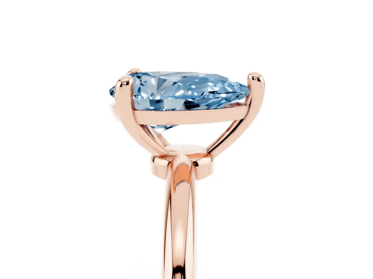 Fancy Blue Pear Cut Solitaire Diamond Ring with 4-Prong Setting on a Classic Band Rose gold