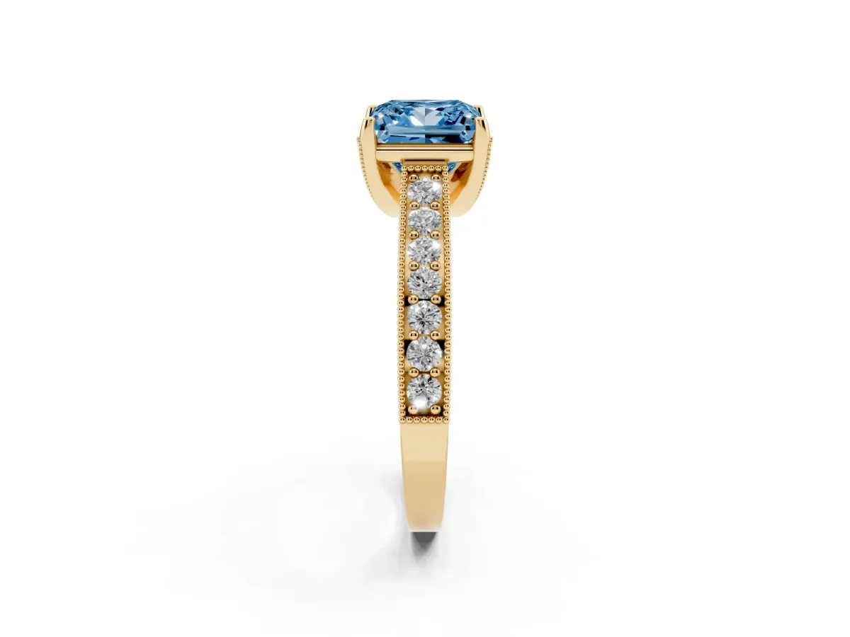 Fancy Blue Princess Cut Cut Diamond Solitaire Ring with Milgrain Pave Band and Four Prong Setting Yellow gold