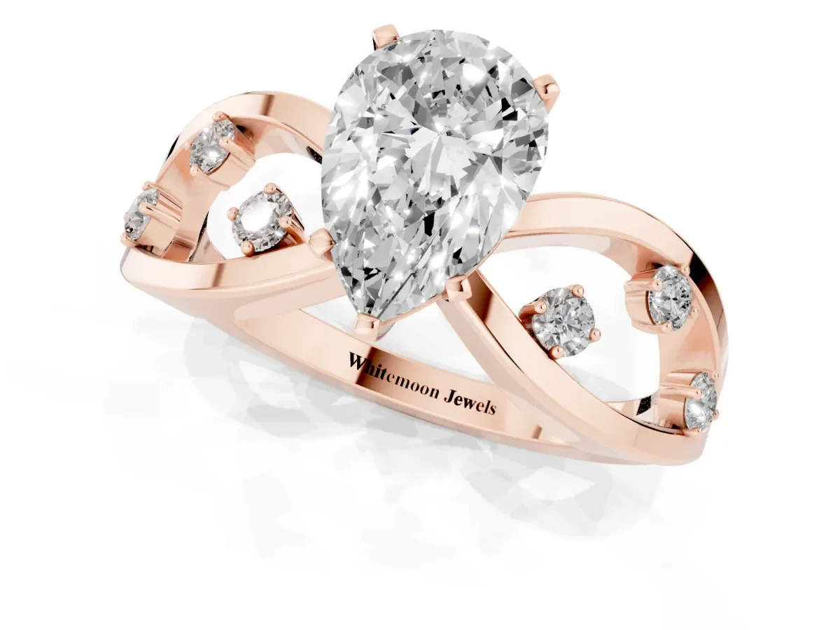 Pear Cut Cut Solitaire Diamond with Side Stones on Criss-Cross Band and Four-Prong Setting Rose gold