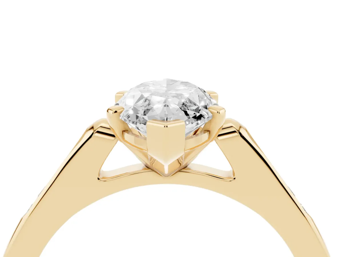 Marquise Cut Diamond Solitaire Ring with Channel Set Round Band and Prong Setting Yellow gold