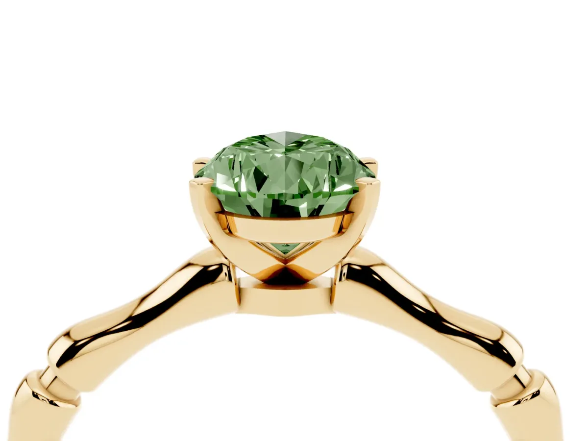 Fancy Green Pear Cut Solitaire Diamond Ring with Bamboo Band and Four-Prong Setting Yellow gold