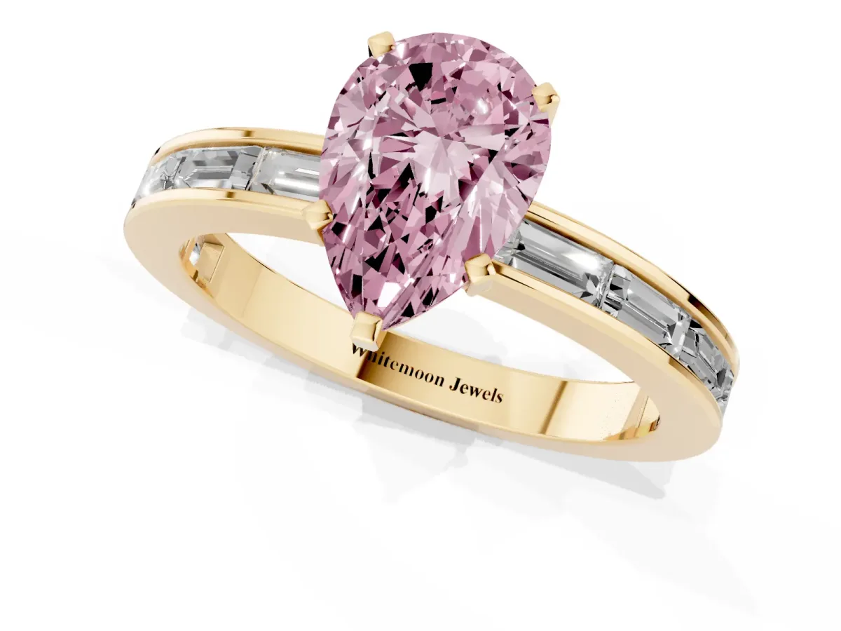 Fancy Pink Pear Cut Solitaire Diamond Ring with Channel-Set Baguette Band and Four-Prong Setting Yellow gold