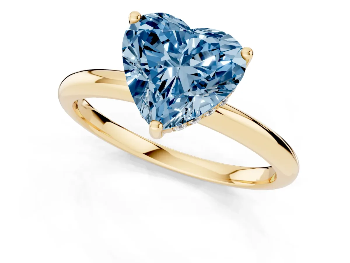 Fancy Blue Heart Cut Cut Solitaire Engagement Ring with Four-Prong Setting and Classic Band Yellow gold