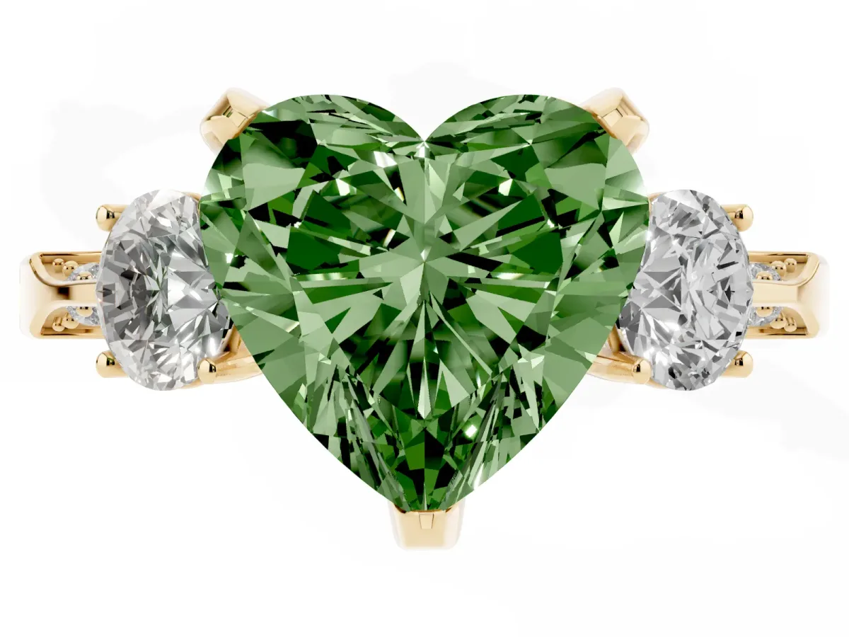 Fancy Green Heart Cut Brilliant Three-Stone Diamond Ring with Pavé Band and Four-Prong Setting Yellow gold