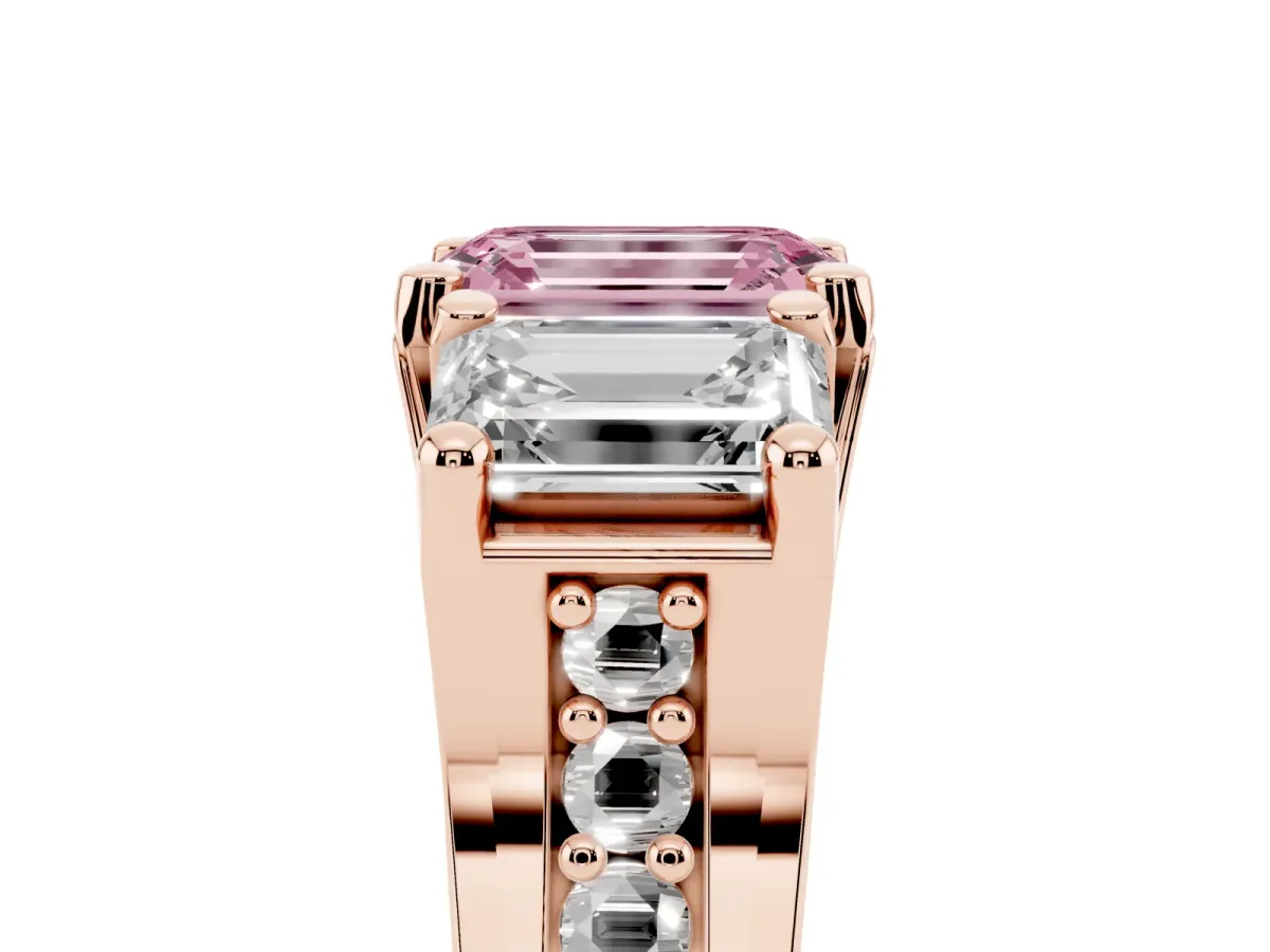 Fancy Pink Emerald Cut Diamond Three-Stone Ring with Channel Set Band and Four-Prong Setting Rose gold