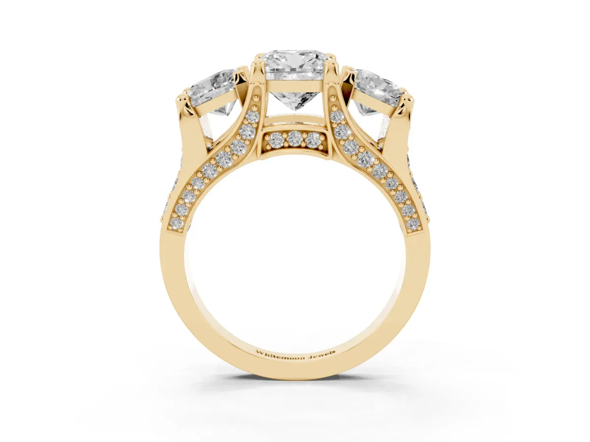 Cushion Cut Diamond Three-Stone Ring with Channel Set Band and Four-Prong Setting Yellow gold