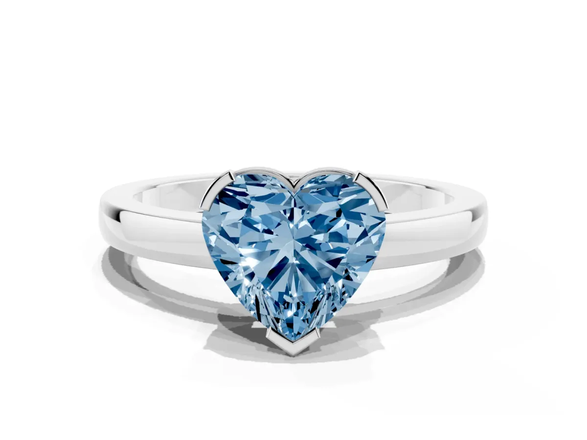 Fancy Blue Heart Cut Cut Solitaire Ring with Four-Prong Setting and Classic Band Silver