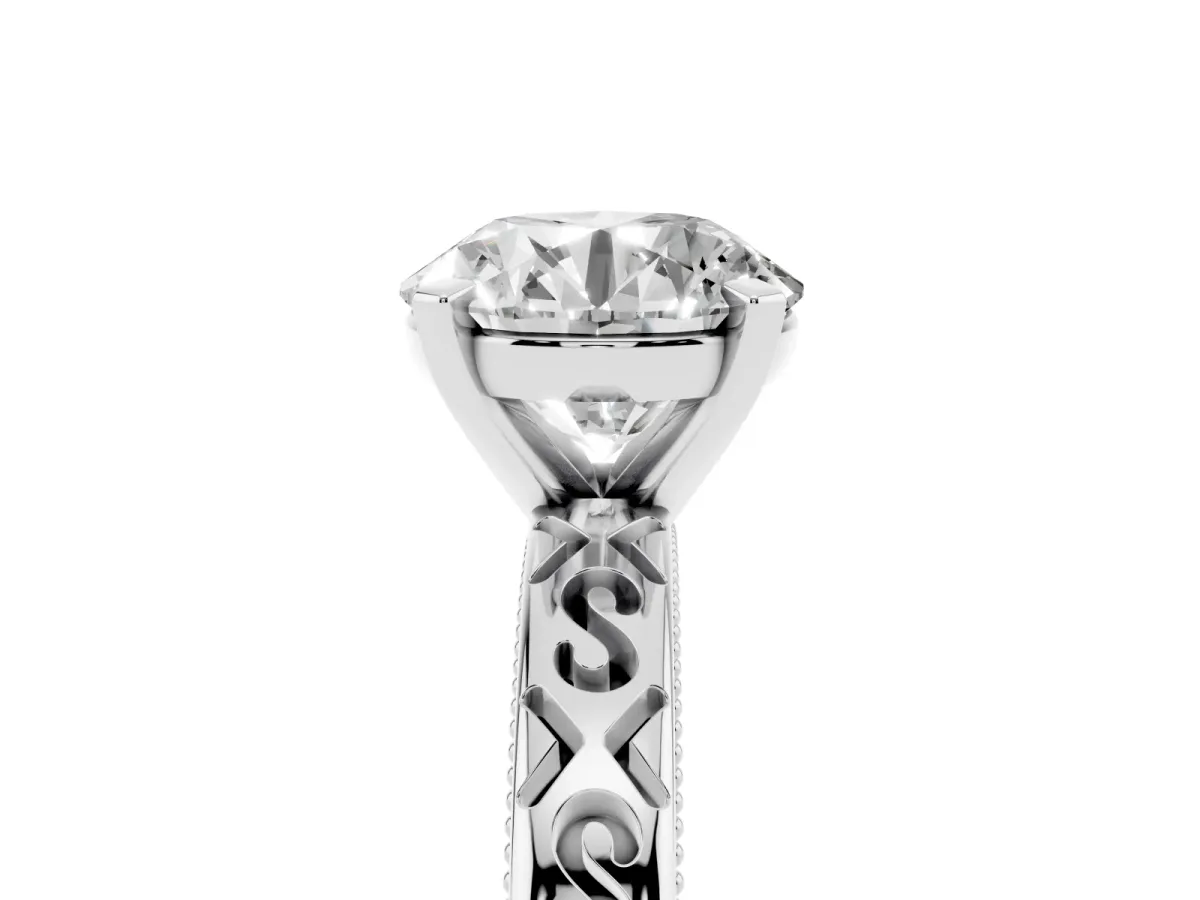 Round Cut Solitaire Engagement Ring with Scrollwork Band and Four-Prong Setting Silver