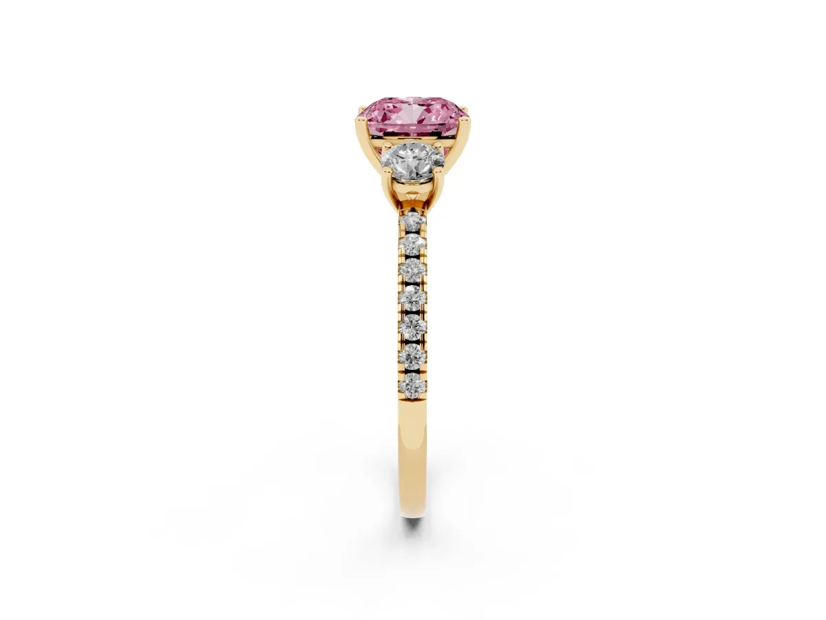 Fancy Pink Three-Stone Cushion Cut Cut Diamond Pavé Band with Prong Setting Yellow gold