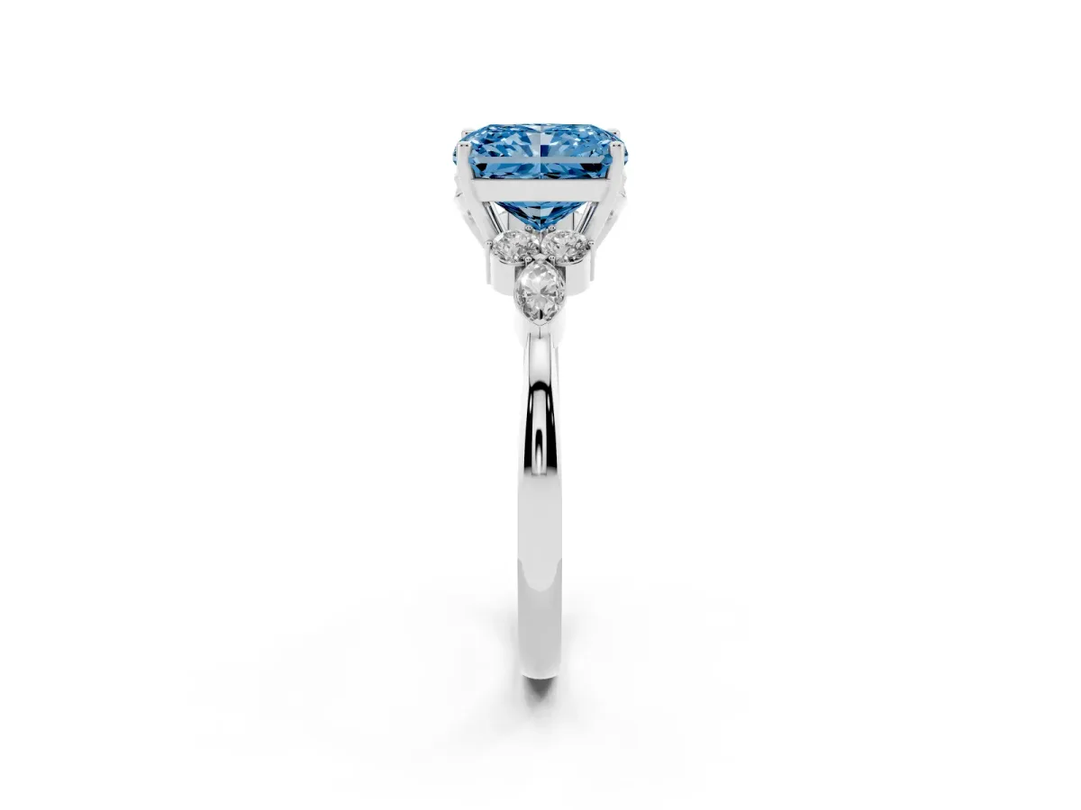 Fancy Blue Radiant Cut Brilliant Diamond Solitaire Ring with Pear Side Stones and Four-Prong Setting Silver