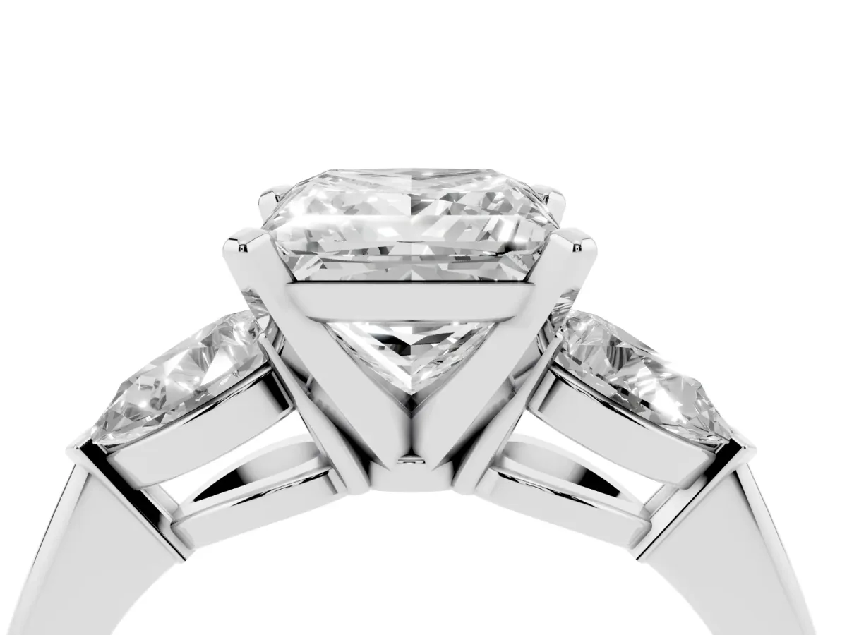Three-Stone Princess Cut Diamond Ring with Pear Side Stones and Four-Prong Setting Platinum