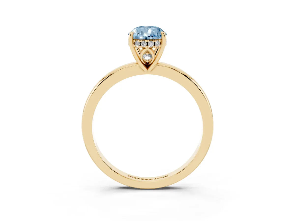 Fancy Blue Pear Cut Solitaire Diamond Ring with Prong Setting and Plain Band Yellow gold