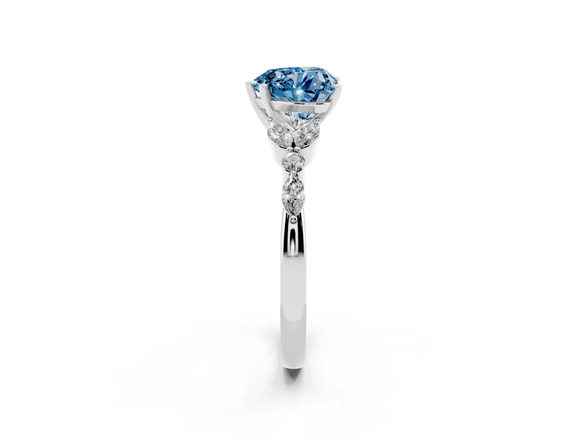 Fancy Blue Heart Cut Diamond Solitaire Ring with Side Stones and Four-Prong Setting Platinum