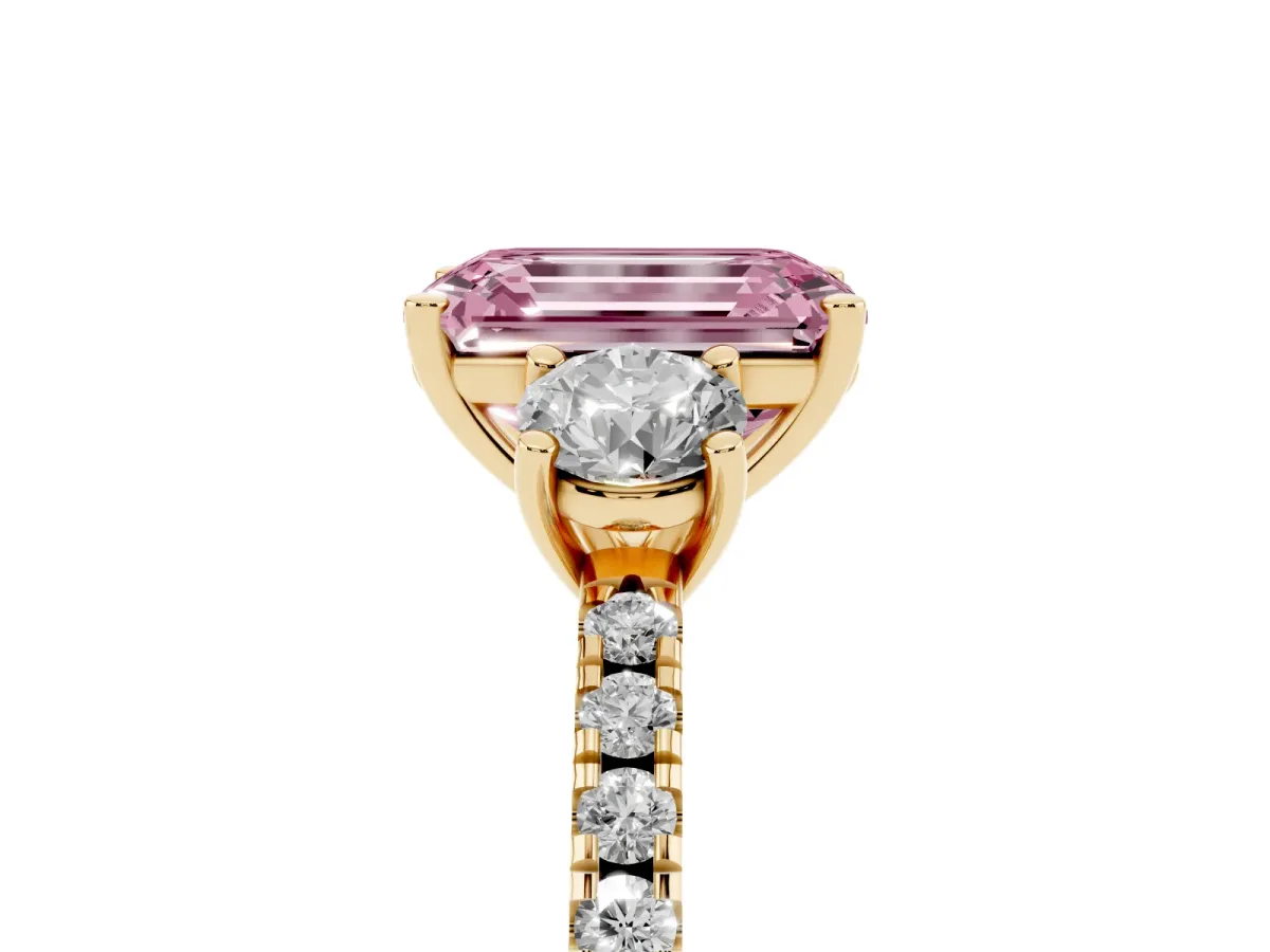 Fancy Pink Three-Stone Emerald Cut Cut Diamond Pavé Band with Prong Setting Yellow gold