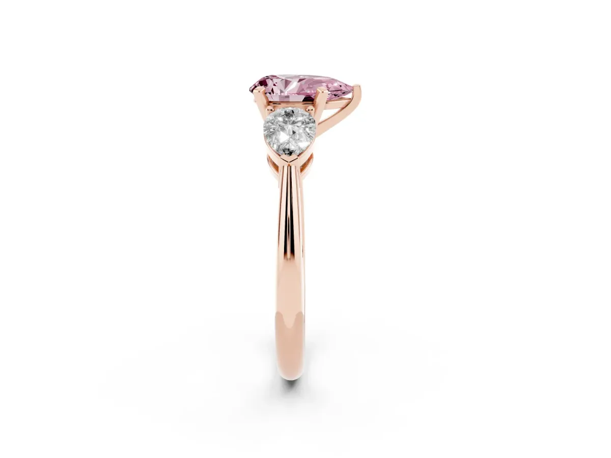 Fancy Pink Three-Stone Pear Cut Diamond Ring with Pear Side Stones and Four-Prong Setting Rose gold