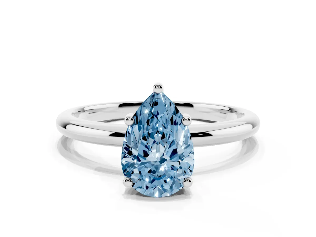 Fancy Blue Pear Cut Cut Solitaire Engagement Ring with Four-Prong Setting and Classic Band Silver