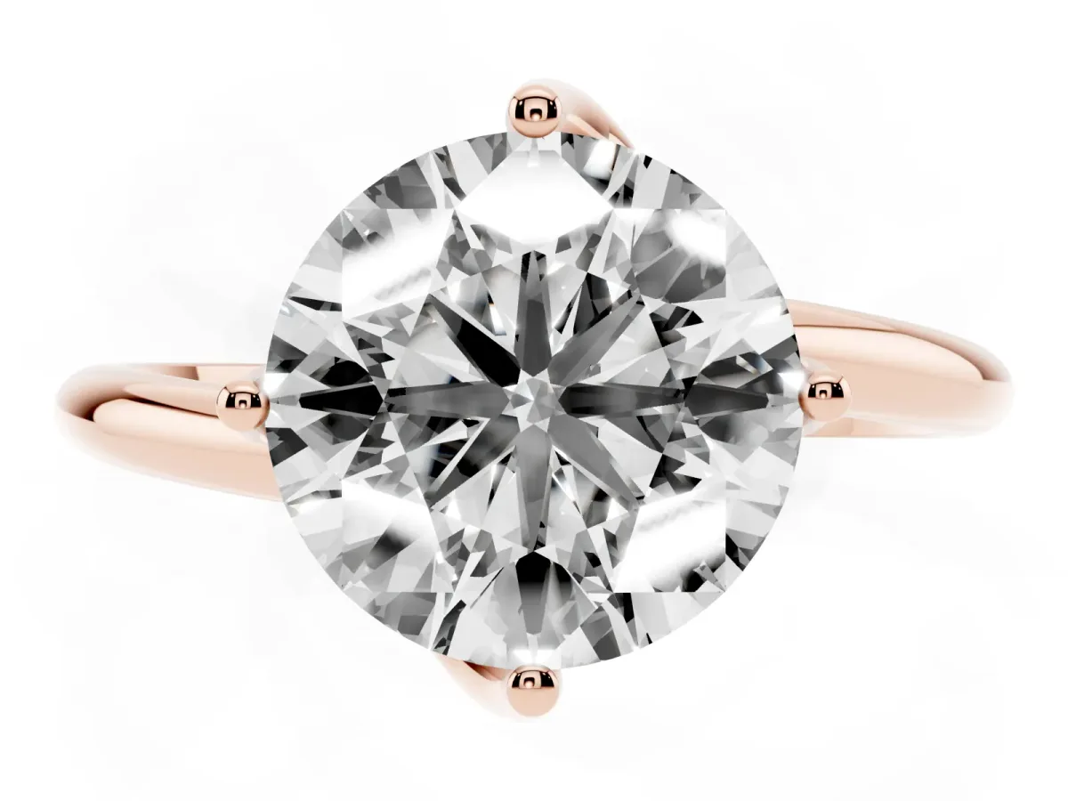 Round Cut Diamond Solitaire Engagement Ring with Four-Prong Setting and Classic Band Rose gold