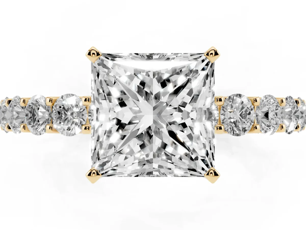 Princess Cut Diamond Solitaire Ring with Shared Prong Pavé Band and Four-Prong Setting Yellow gold
