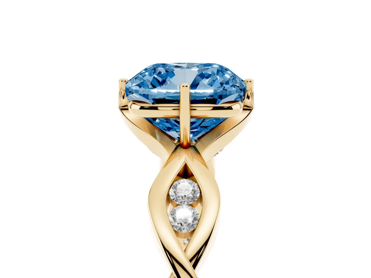 Fancy Blue Cushion Cut Solitaire Twist Band with Leaf Prong Setting Yellow gold