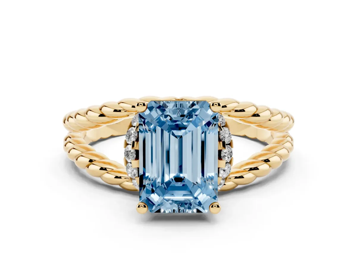 Fancy Blue Emerald Cut Halo Twisted Band Four-Prong Ring Yellow gold