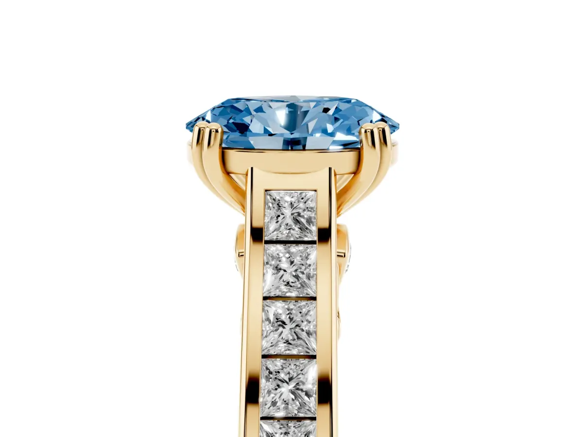 Fancy Blue Oval Cut Cut Channel Set Solitaire Engagement Ring with Prong Setting Yellow gold