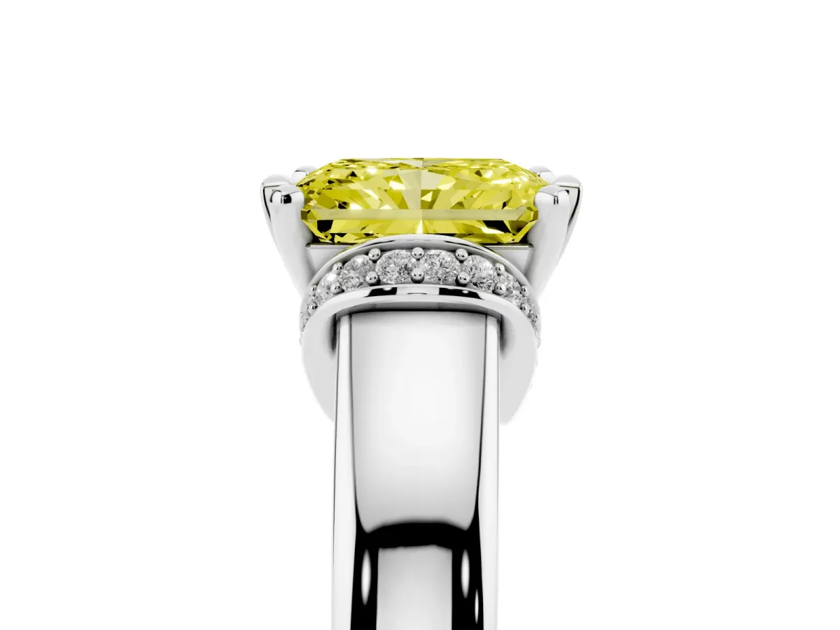 Fancy Yellow Radiant Cut Solitaire Diamond Ring with Pave Band and Six-Prong Setting Platinum