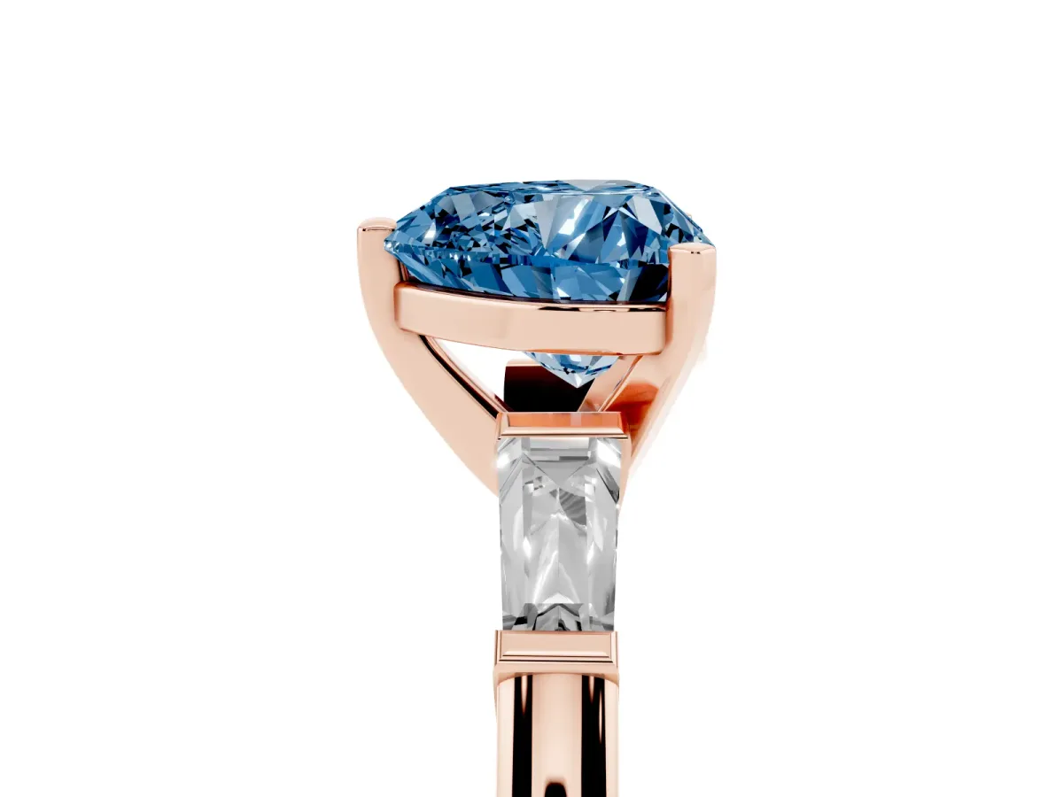 Fancy Blue Heart Cut Solitaire with Tapered Baguette Side Stones on a Classic Band with Four-Prong Setting Rose gold