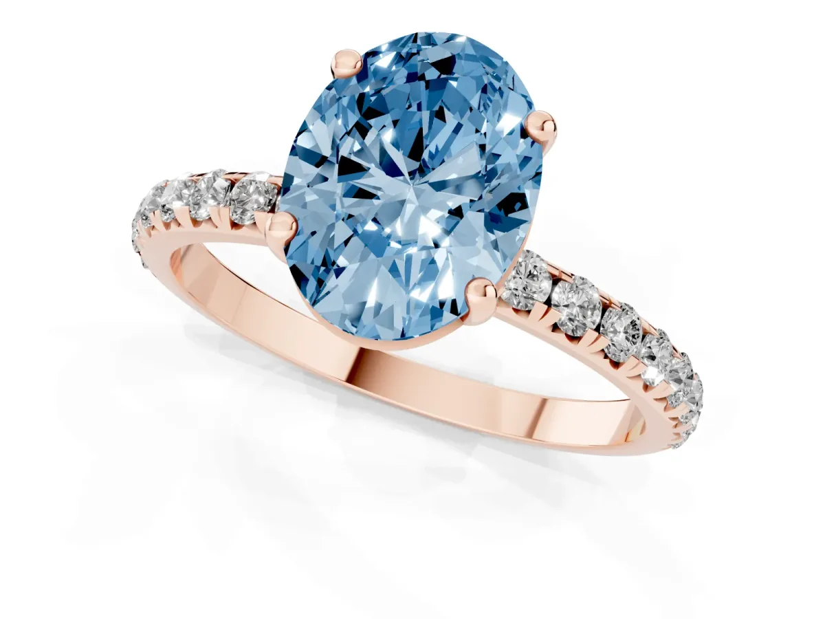 Fancy Blue Oval Cut Cut Diamond Solitaire Ring with Micro Pave Band and Four Prong Setting Rose gold
